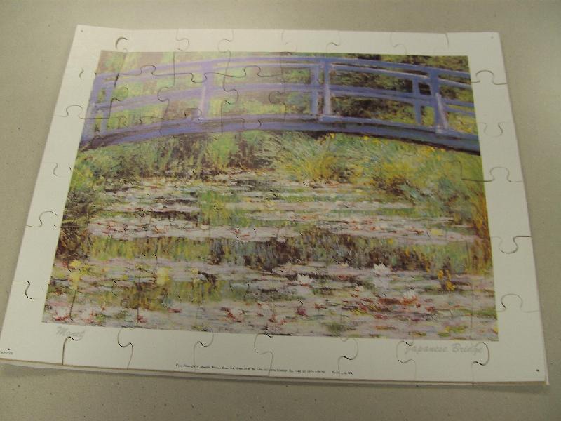 P402.jpg - "Tuin met  Japanse brug" Monet 48 stukken