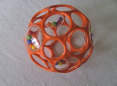 H058.jpg - oranje rattle ball